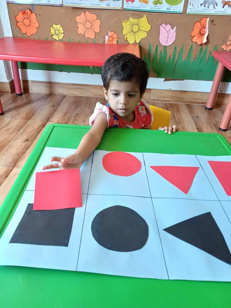Playgroup child with learning toys
