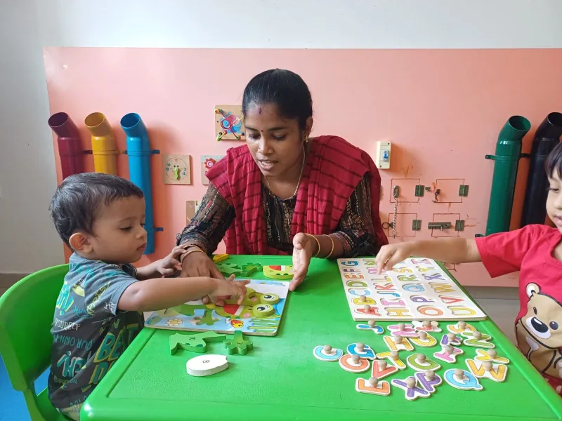 Children playing together indoors