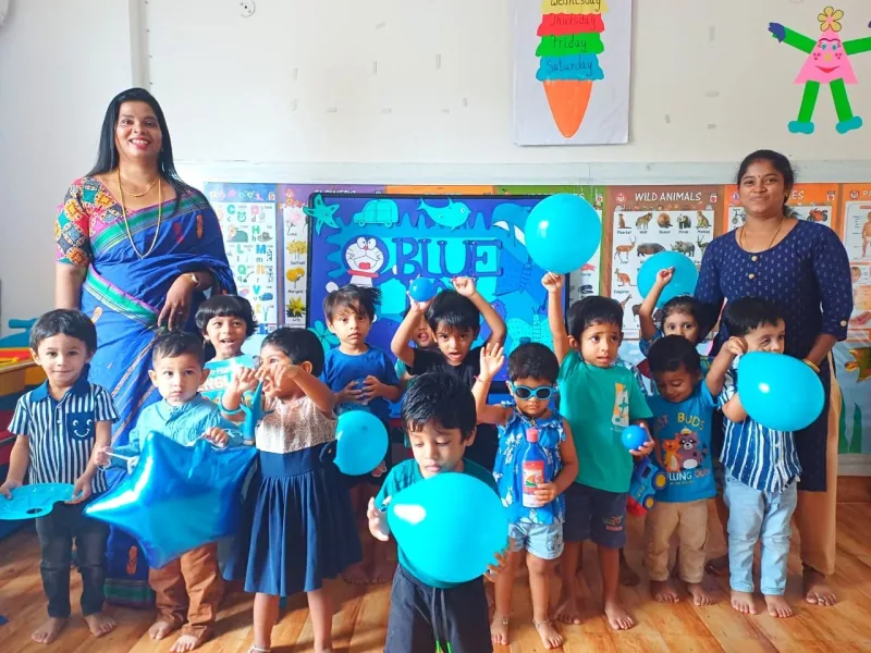 Playgroup children at an activity table